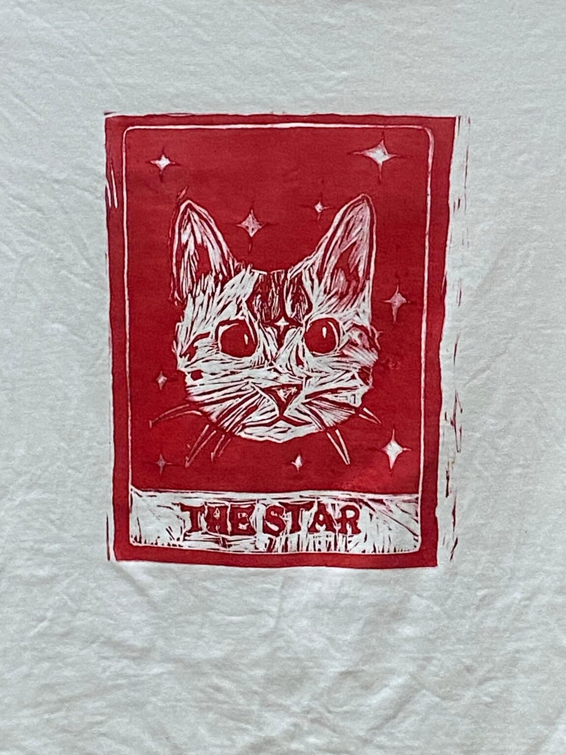 "the star  2025 lino print on t shirt  "